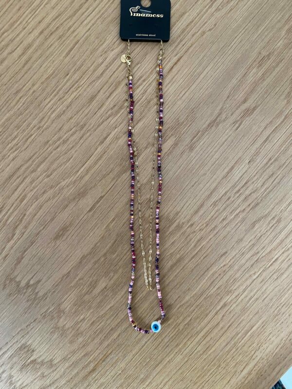 Collier double chaine avec perle et oeil